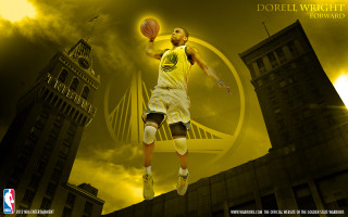 Man yellow uniform jumping basketball - his hand and a city in the background free wallpaper