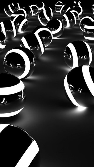 Balls faces numbers black white - a group of balls free wallpaper