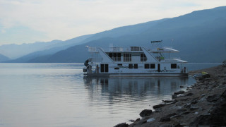 Large boat lake mountain range - evaline ness free wallpaper