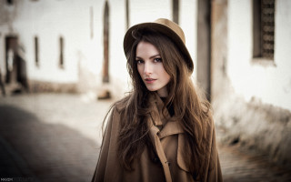 Woman brown coat hat portrait - a brick walkway free wallpaper