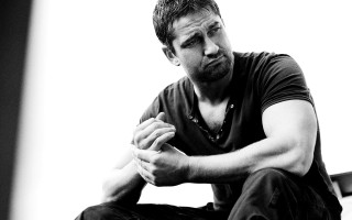 Man sitting floor hands folded - handsome free wallpaper