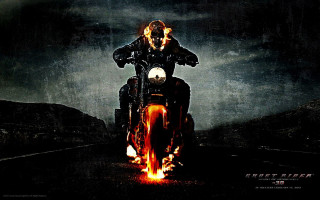 Man motorcycle dark road fire - a dark sky behind free wallpaper