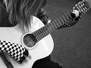 Woman playing guitar checkered tie - quito school free wallpaper for desktop