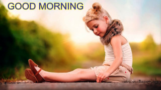 Little girl sitting ground feet - a caption free wallpaper