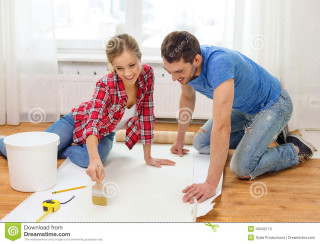 Man woman painting room together - woman free wallpaper