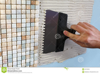 Hand pressing button wall tile - a button free wallpaper