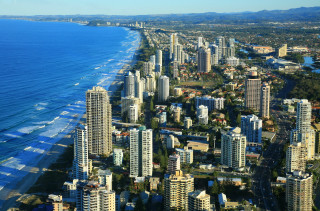 City ocean shoreline tall buildings - zenith view free wallpaper