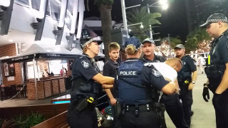 Police officers nighttime sidewalk palm - movie scene free wallpaper