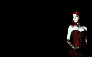Woman red hair corset gloves - dark background free wallpaper