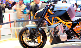 Motorcycle showroom display crowd people - a crowd of people free wallpaper