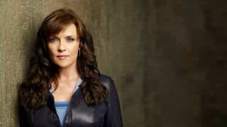 Woman leaning wall eyes closed 2 - a jacket free wallpaper for desktop