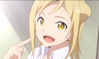 Blonde girl pointing finger mouth - her shirt free wallpaper