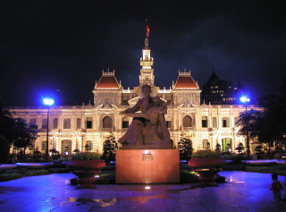 Statue woman building night lights - academic free wallpaper