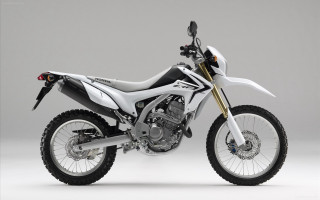 White motorcycle parked white floor - a white floor next free wallpaper