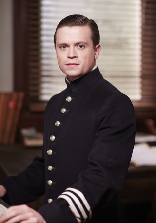 Man uniform sitting desk keyboard - a man in a uniform free wallpaper