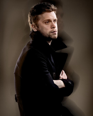 Man arms crossed serious look - his face and shoulders free wallpaper for mobile