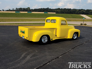 Yellow truck parking lot grass - a yellow truck free wallpaper
