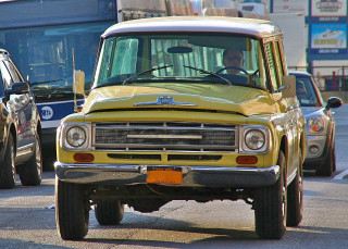 Yellow truck driving street bus - a yellow truck free wallpaper