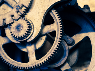 Close up clock gears dial 3 - a close up of a clock free wallpaper