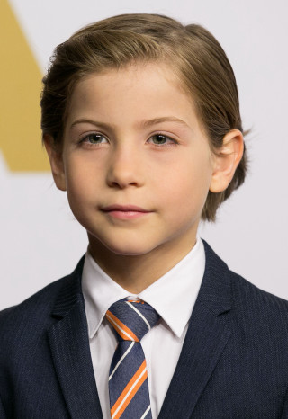 Young boy suit tie serious - his face and shoulders free wallpaper