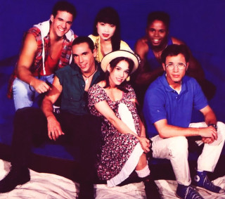 Group posing bed blue background - araceli gilbert free wallpaper for tablet