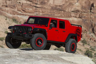 Red jeep rock cliff digital - a rock in front free wallpaper
