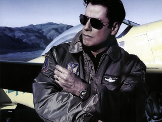 Man leather jacket sunglasses plane - the background and a mountain range in the distance free wallpaper