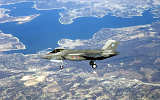 Fighter jet city lake sky - a landing free wallpaper