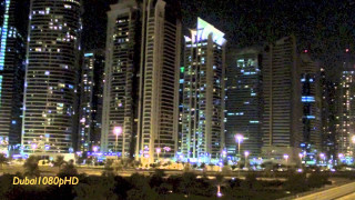 City skyline night train passing - hurufiyya free wallpaper for desktop