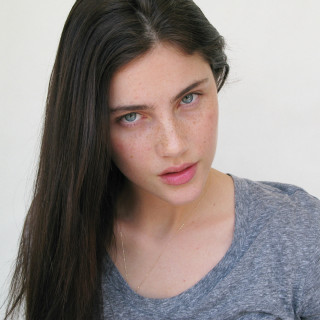 Woman long hair serious look 3 - mannerism free wallpaper for tablet