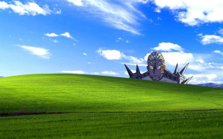 Green field building blue sky - menacing free wallpaper