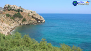 Rocky cliff ocean blue sky 2 - a rocky cliff free wallpaper