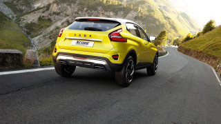 Yellow car driving road mountain - side profile free wallpaper