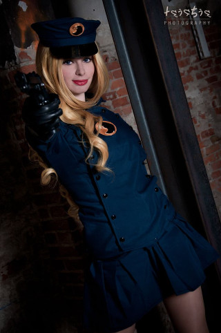 Woman uniform gun pose brick - claire falkenstein free wallpaper for mobile