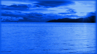 Boat water cloudy sky mountains 5 - the water under a cloudy sky free wallpaper