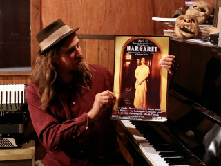 Man holding poster piano top - alice mason free wallpaper for desktop