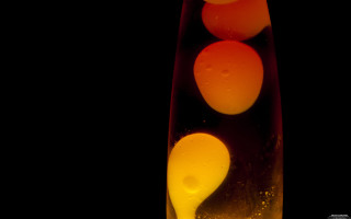 Glass liquid oranges black background - an abstract sculpture free wallpaper