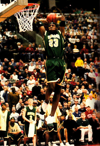 Man dunking basketball crowd stadium - a stadium free wallpaper for mobile