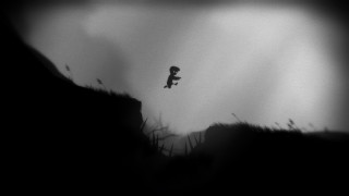 Person jumping cliff kite dark - a dark sky free wallpaper