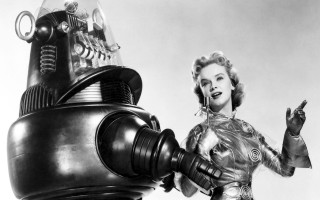 Futuristic suit woman robot arm - a futuristic suit holding free wallpaper for desktop