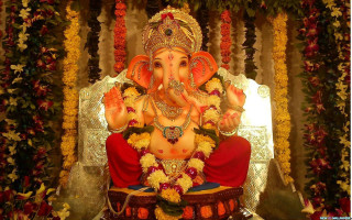 Ganesha statue flowers garland man - a red robe free wallpaper for desktop