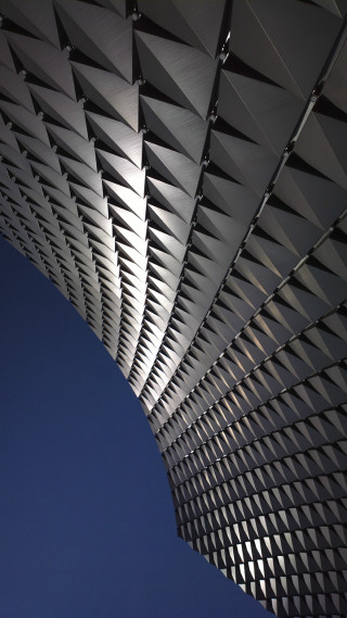 Tall building long roof skyline - free architecture wallpaper for mobile