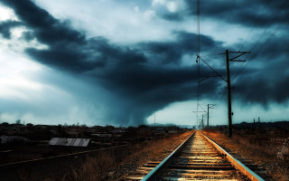 Train track dark clouds telephone - a sky free wallpaper for desktop