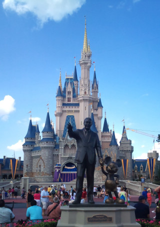 Walt mickey statue castle people - people sitting free wallpaper
