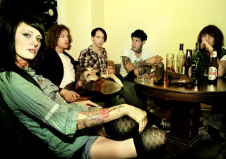 Group people table wine bottles - a group of people sitting free wallpaper for desktop