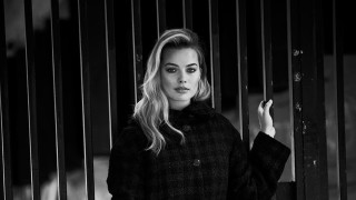 Woman black coat fence smoking - a black coat free wallpaper