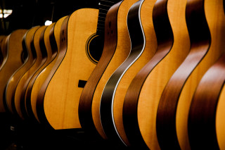 Guitars row brown black stripe - a black stripe free wallpaper