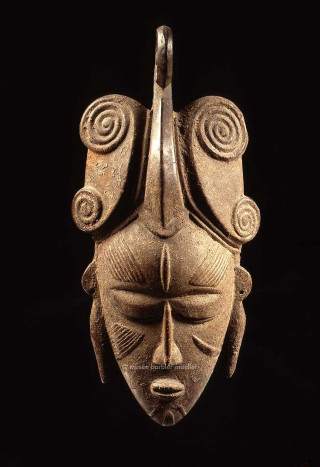 Wood metal mask face artistic - an abstract sculpture free wallpaper