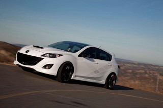 White car driving hill fenced - andrew bell free wallpaper