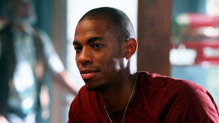 Man necklace restaurant sitting camera - a restaurant free wallpaper for desktop